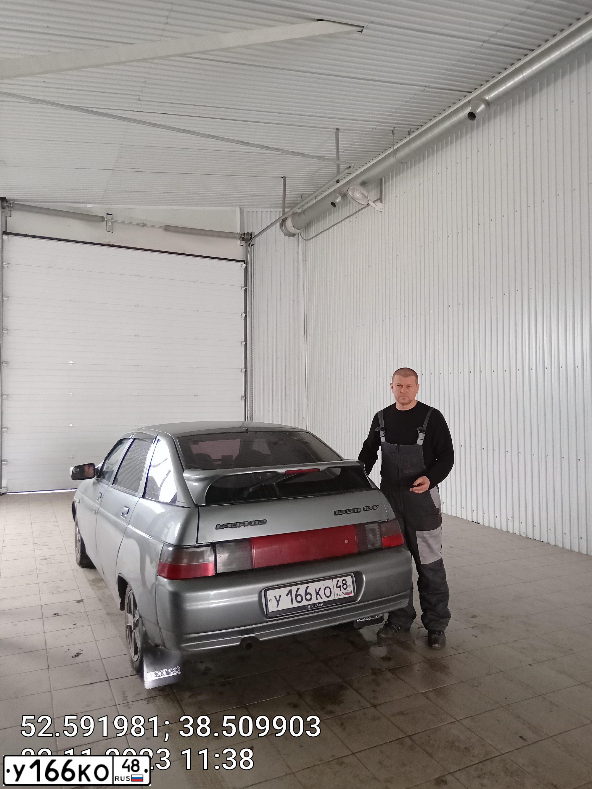Фото автомобиля LADA 2112, 2007 — госномер В946КС62. Цвет: СРЕДНИЙ СЕРО-ЗЕЛЕНЫЙ МЕТ