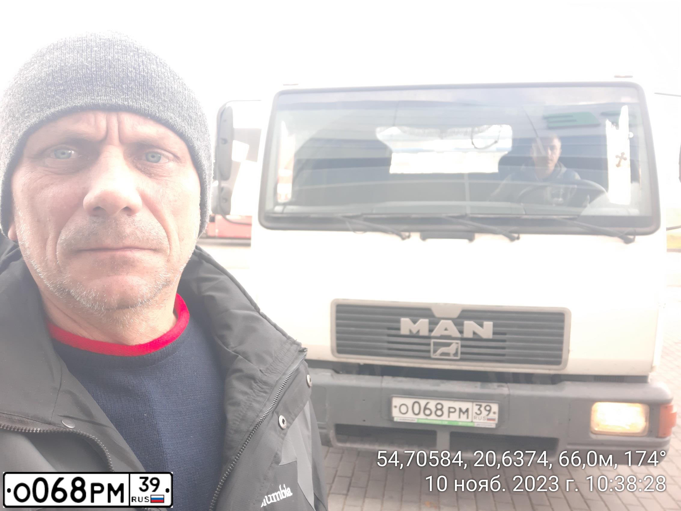 Фото автомобиля MAN L 2000, 1997 — госномер О068РМ39. Цвет: БЕЛЫЙ