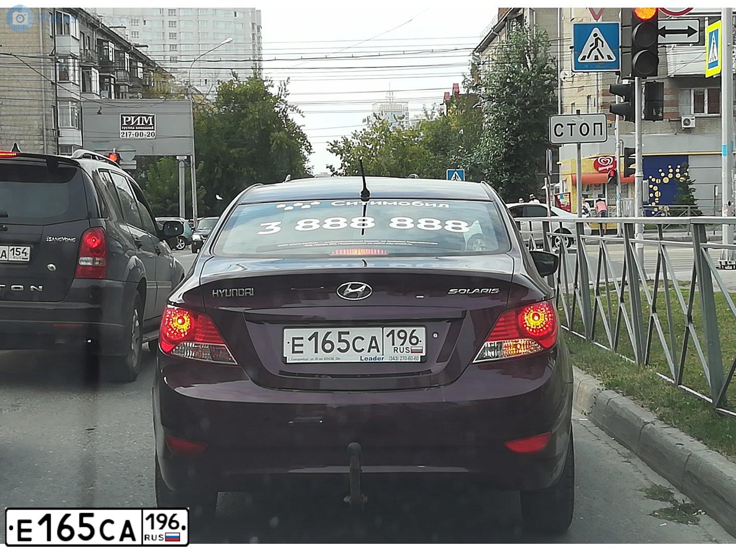 Фото автомобиля HYUNDAI SOLARIS, 2011 — госномер Е165СА196. Цвет: ФИОЛЕТОВЫЙ