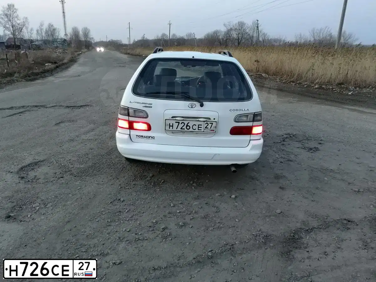 Фото автомобиля TOYOTA COROLLA, 1999 — госномер Н726СЕ27