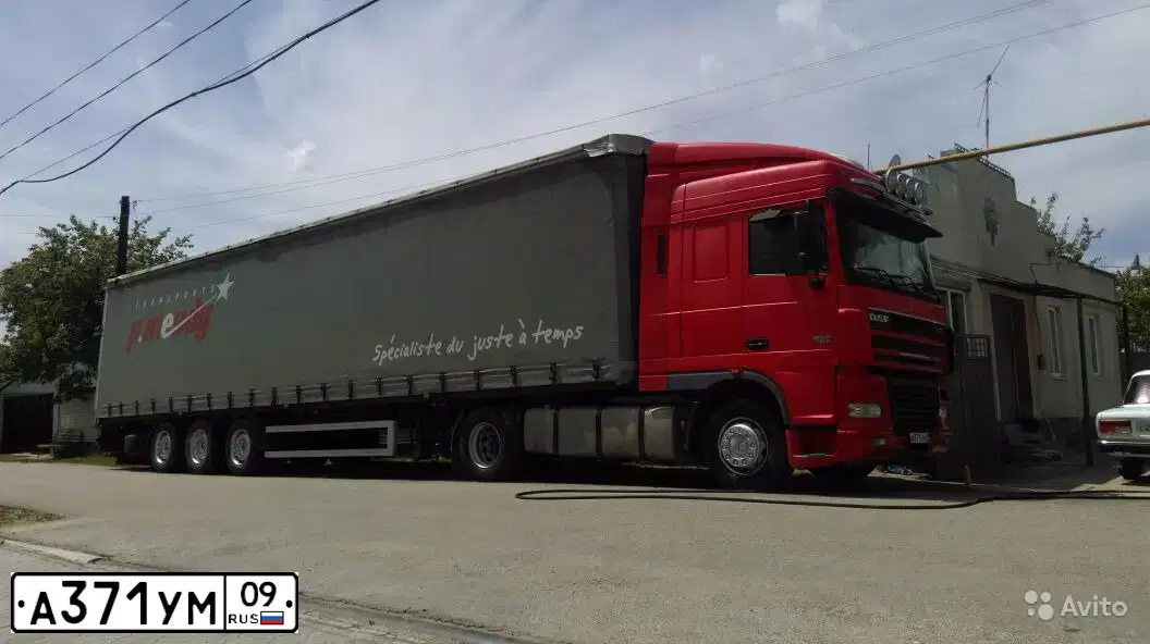 Фото автомобиля DAF XF 95 FT /4X2/, 2012 — госномер А371УМ09. Цвет: Красный