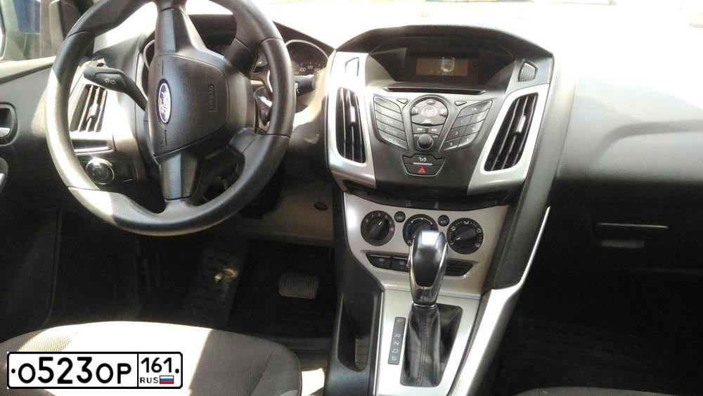 Фото автомобиля FORD FOCUS, 2012 — госномер Е774НМ761. Цвет: Темно-синий