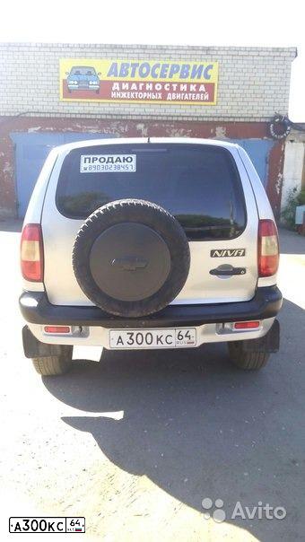 Фото автомобиля CHEVROLET NIVA, 2004 — госномер А300КС64. Цвет: Светло-серебристый металик