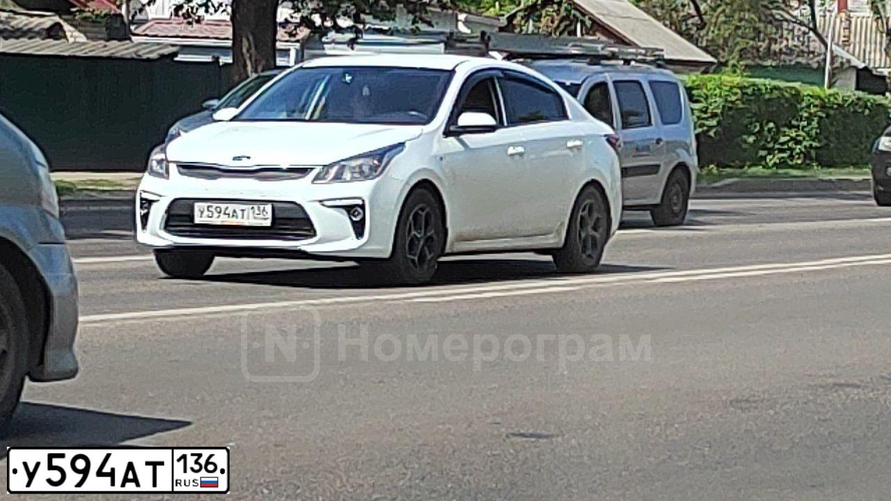 Фото автомобиля KIA RIO, 2017 — госномер У594АТ136. Цвет: Белый