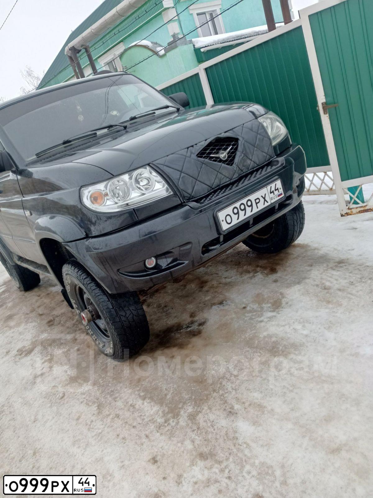 Фото автомобиля UAZ 3163 PATRIOT, 2009 — госномер О999РХ44. Цвет: ЧЕРНЫЙ