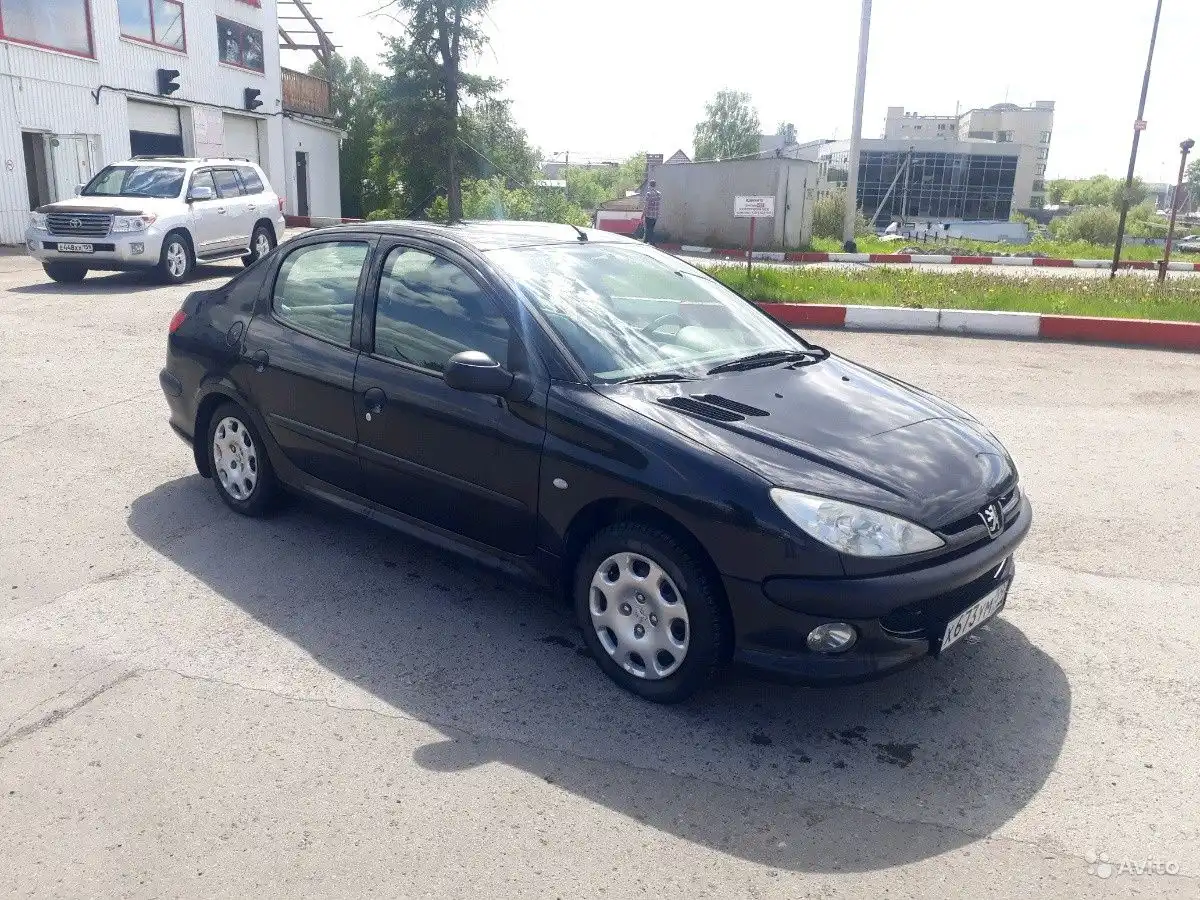 Фото автомобиля PEUGEOT 206, 2008 — госномер Н074МХ159. Цвет: ЧЕРНЫЙ