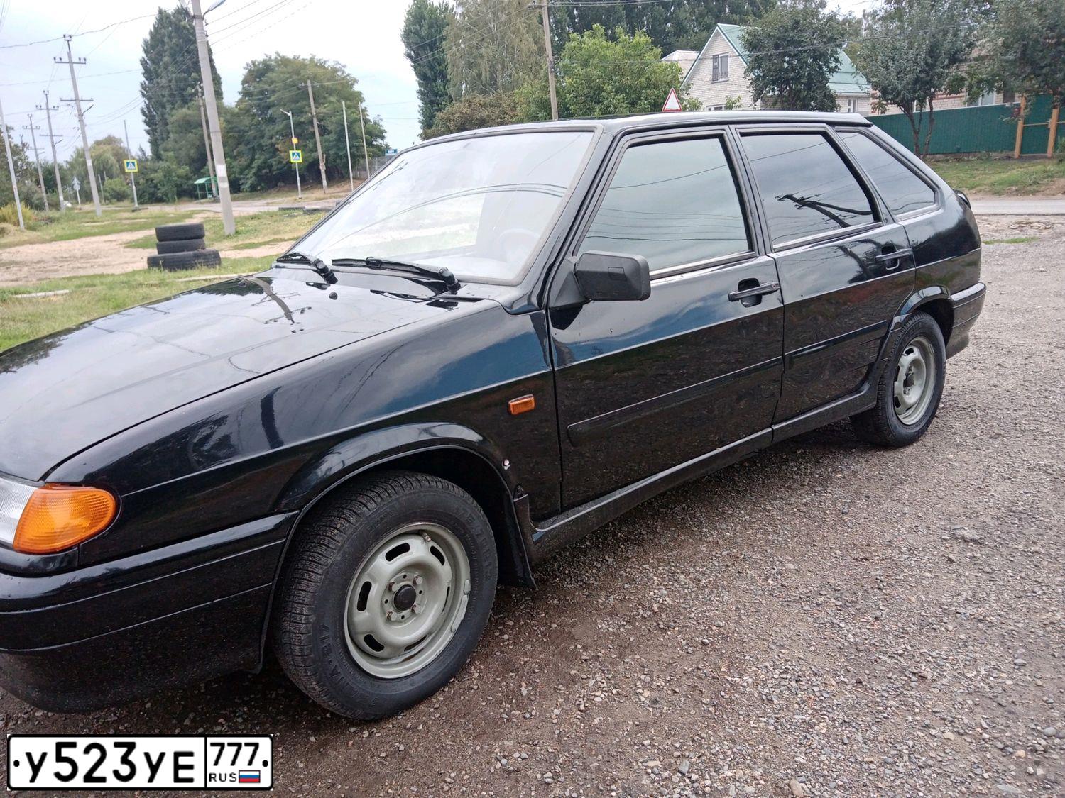 Фото автомобиля LADA 2114 SAMARA, 2013 — госномер Р149АВ777. Цвет: Сине-Черный