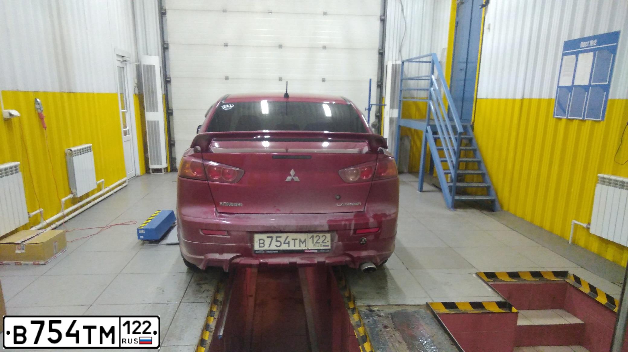 Фото автомобиля MITSUBISHI LANCER, 2008 — госномер В754ТМ122. Цвет: Красный