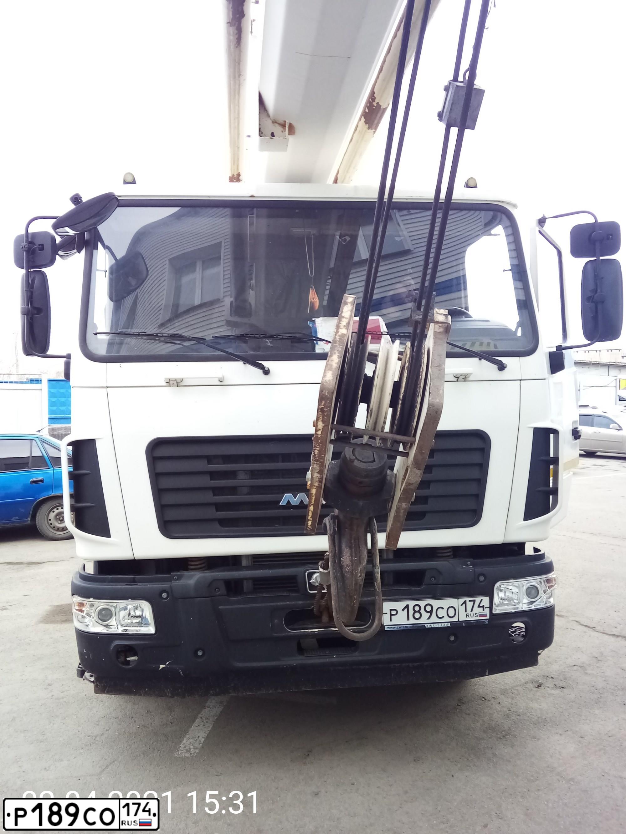 Фото автомобиля MAZ MAN MAZ-MAN 6312 /6X4/, 2013 — госномер Р189СО174. Цвет: БЕЛЫЙ