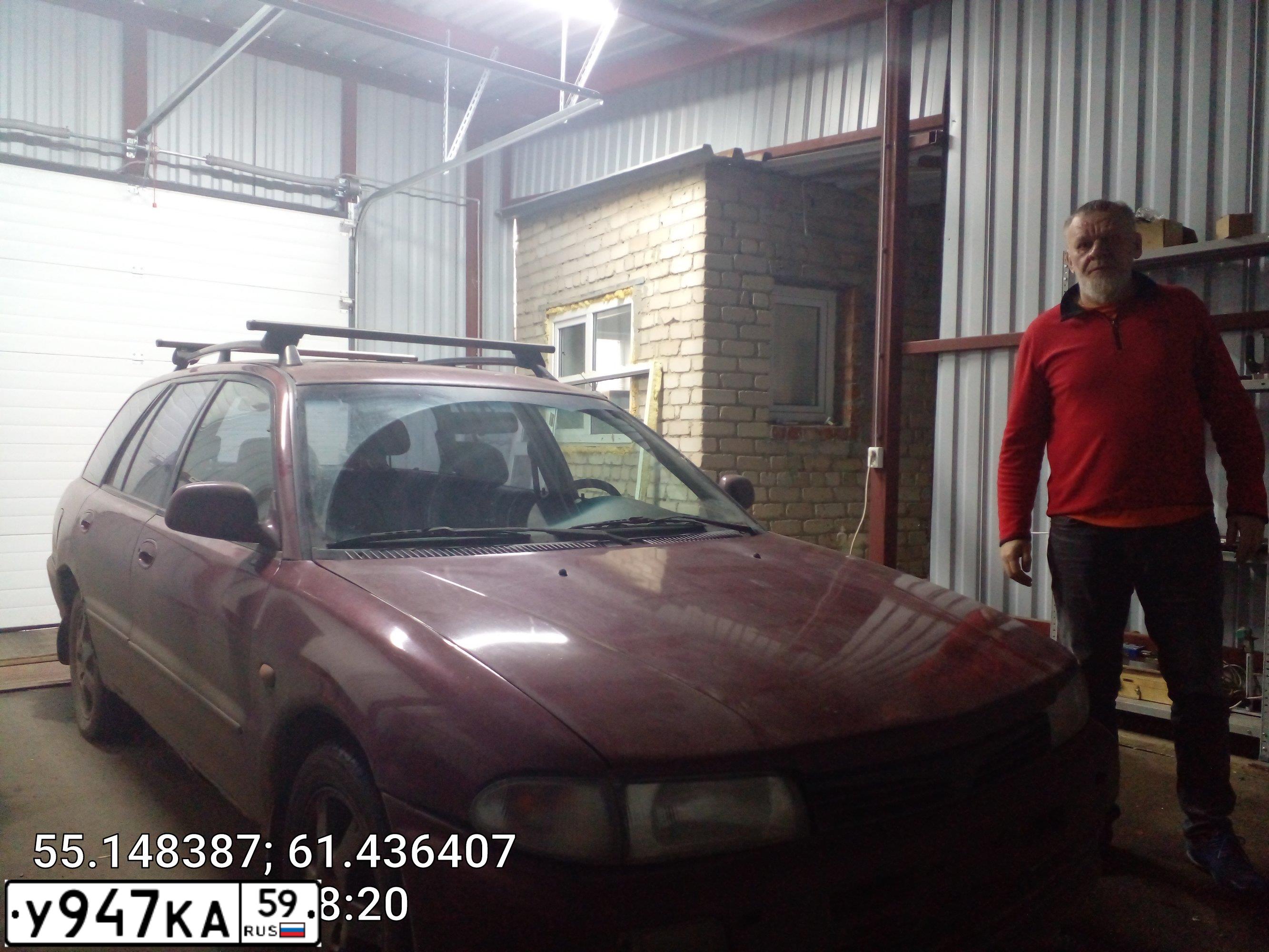 Фото автомобиля МIТSUВISНI-LАNСЕR-GLХI, 2000 — госномер Е954АЕ159. Цвет: ВИШНЕВЫЙ