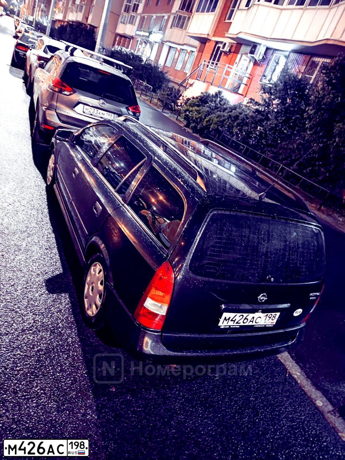 Фото автомобиля OPEL ASTRA, 2000 — госномер У044МР198. Цвет: ЧЕРНЫЙ