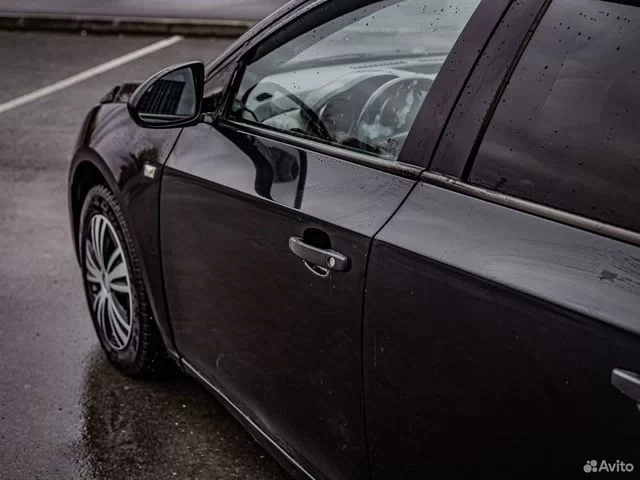 Фото автомобиля CHEVROLET CRUZE, 2010 — госномер С647УН72. Цвет: ЧЕРНЫЙ