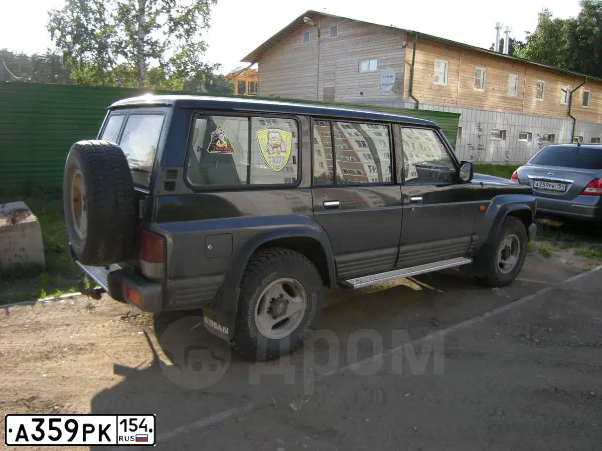 Фото автомобиля NISSAN TIIDA, 2007 — госномер А359РК154. Цвет: СЕРЫЙ