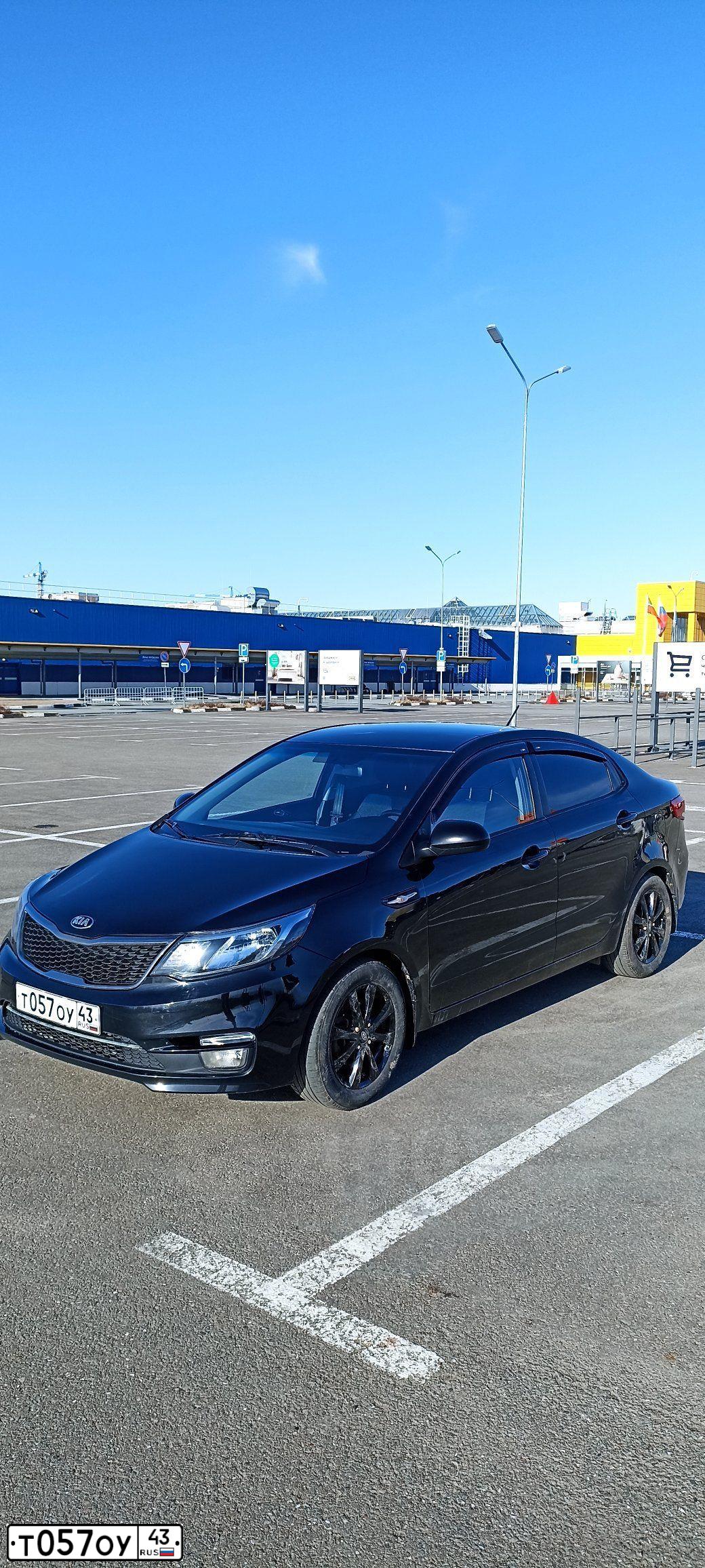 Фото автомобиля KIA RIO, 2015 — госномер Т057ОУ43. Цвет: ЧЕРНЫЙ