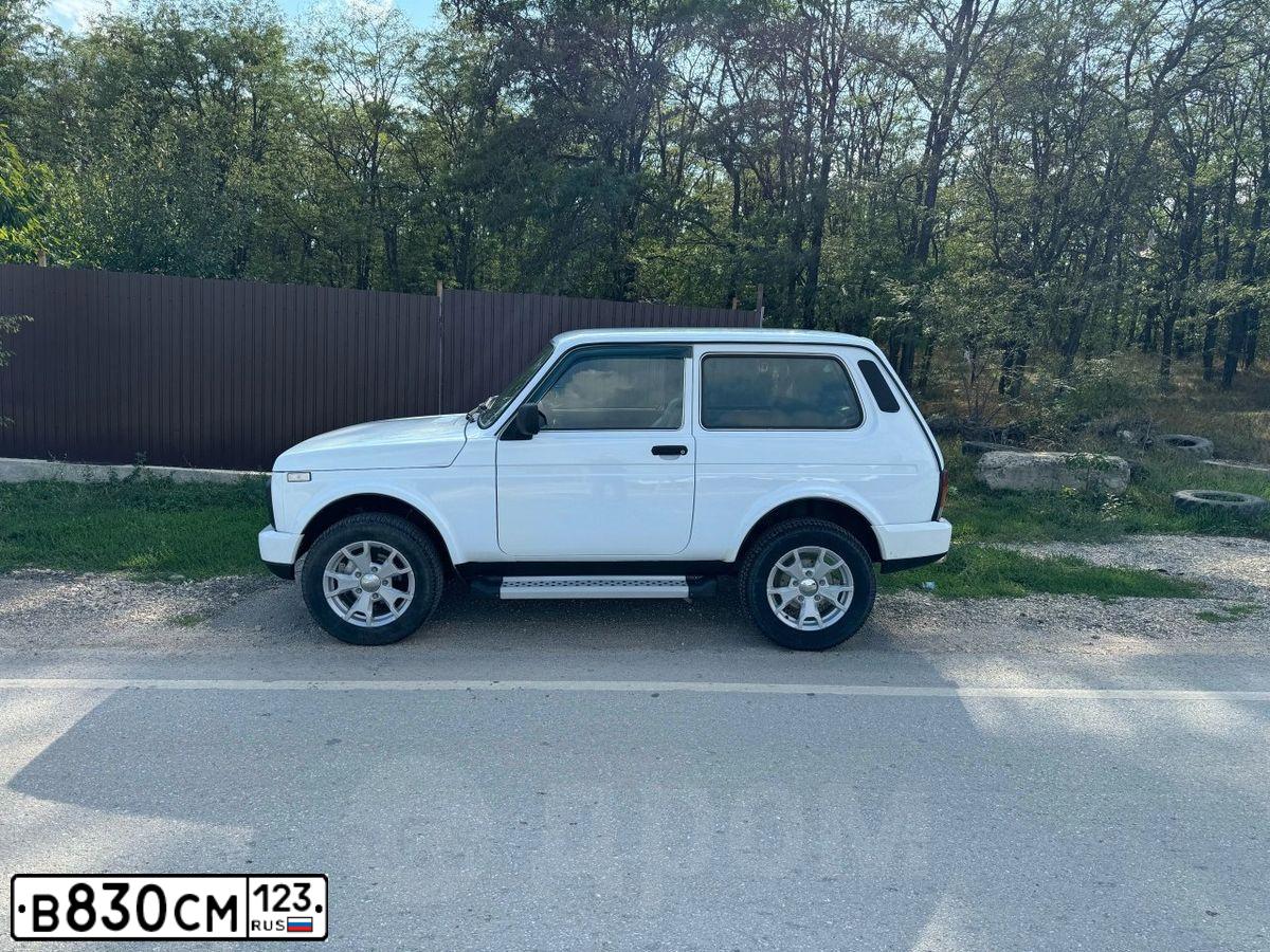Фото автомобиля LADA 2121 NIVA, 2016 — госномер Т915НС39. Цвет: ЯРКО-БЕЛЫЙ