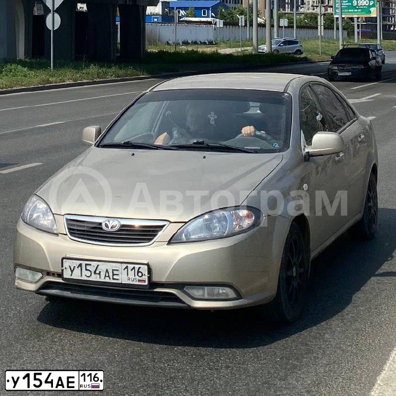 Фото автомобиля DAEWOO GENTRA, 2014 — госномер У154АЕ116. Цвет: САХАРА