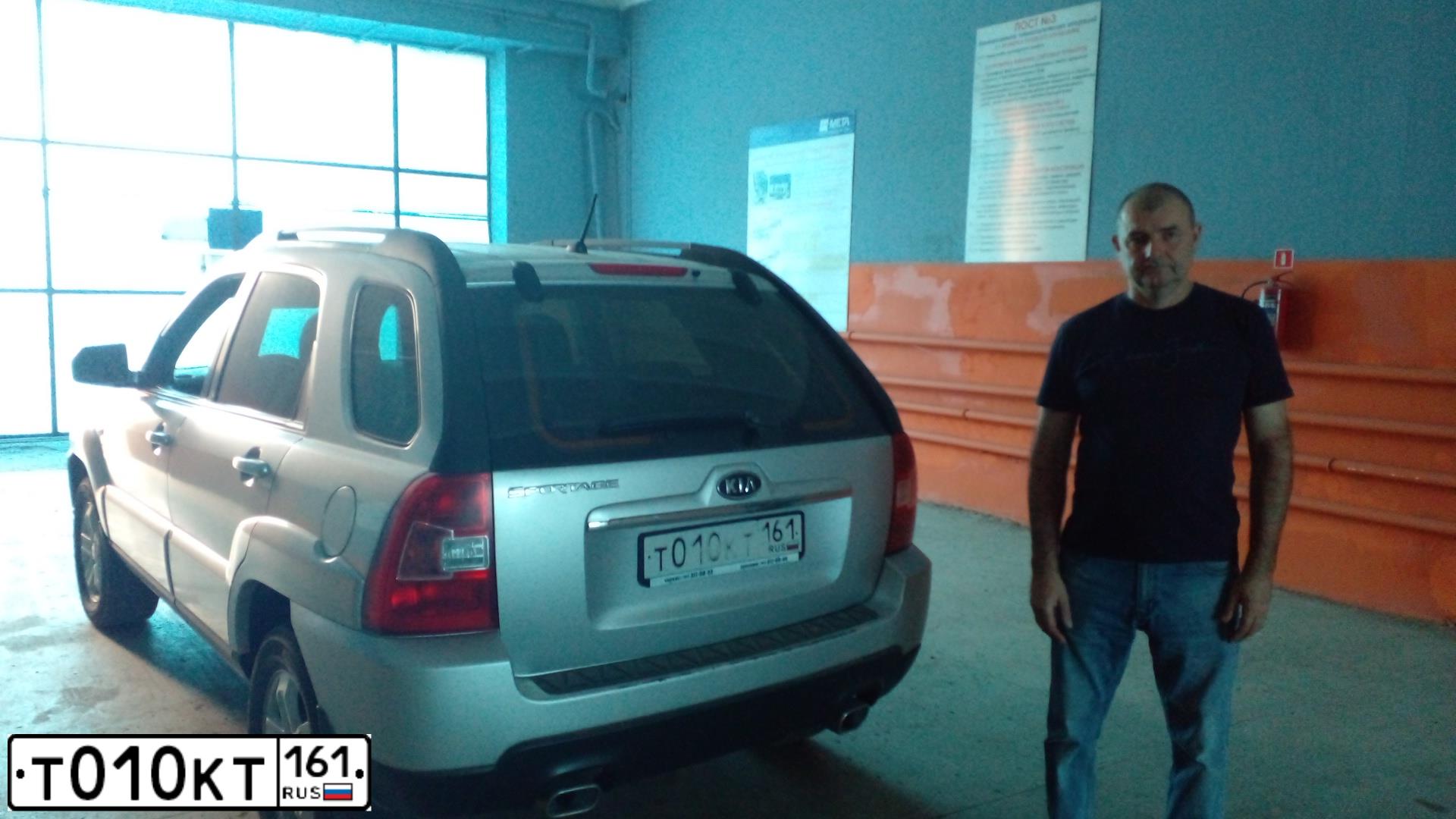 Фото автомобиля KIA SPORTAGE, 2010 — госномер Т010КТ161. Цвет: ПЕРЛАМУТР.-СЕРЕБРИСТ