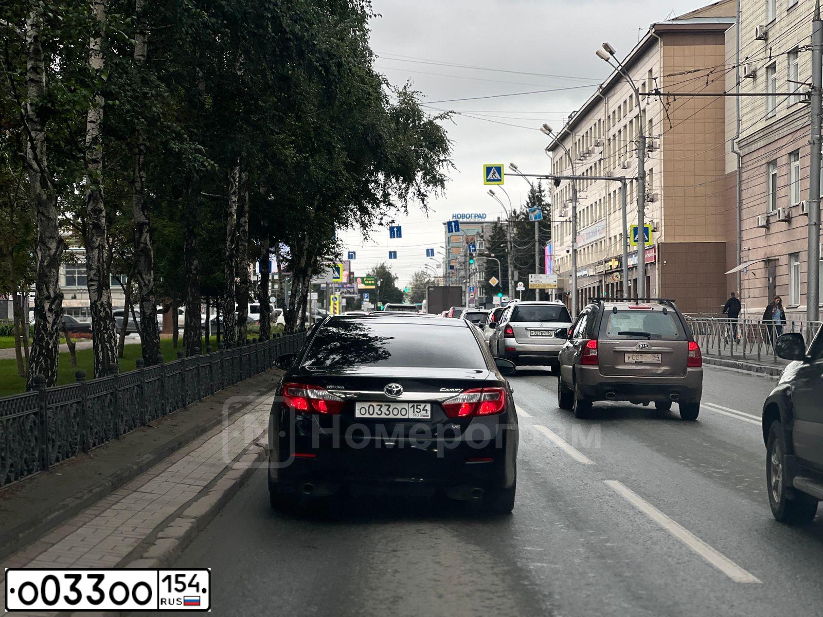 Фото автомобиля TOYOTA CAMRY, 2012 — госномер Н040НН154. Цвет: ЧЕРНЫЙ МЕТАЛЛИК