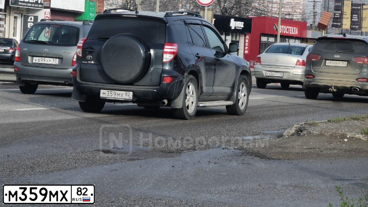 Фото автомобиля TOYOTA RAV4, 2012 — госномер Н901АХ142. Цвет: ТЕМНО-СЕРЫЙ
