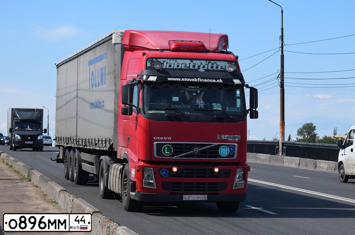 Фото автомобиля VOLVO SERIE FH /4X2/, 2002 — госномер О896ММ44. Цвет: Красный
