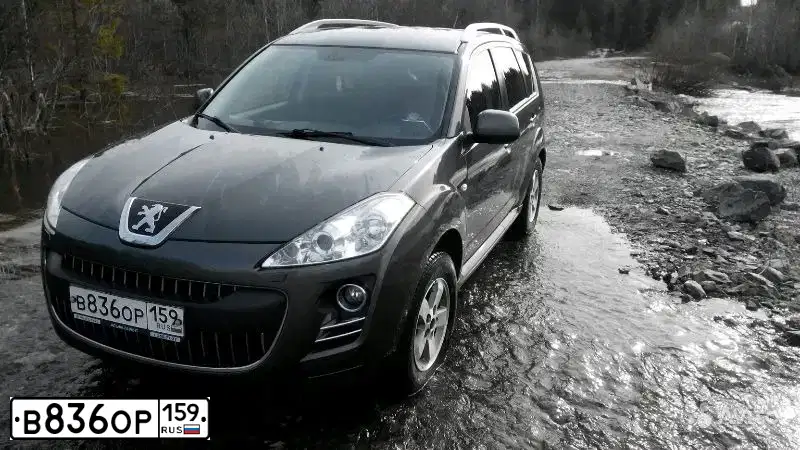 Фото автомобиля PEUGEOT 4007, 2012 — госномер Е760ВХ702. Цвет: СЕРО ЗЕЛЕНЫЙ