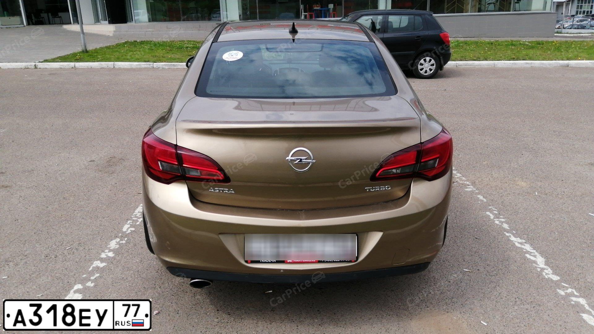 Фото автомобиля OPEL ASTRA, 2013 — госномер Е306ТЕ716. Цвет: БЕЖЕВЫЙ МЕТАЛЛИК
