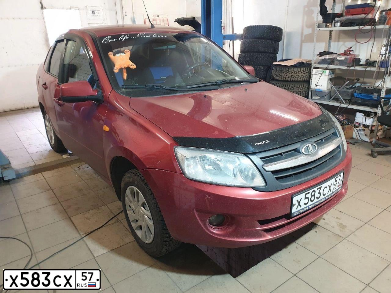 Фото автомобиля LADA 2190 GRANTA, 2013 — госномер Х583СХ57. Цвет: СЕРЕБРИСТО-КРАСНЫЙ