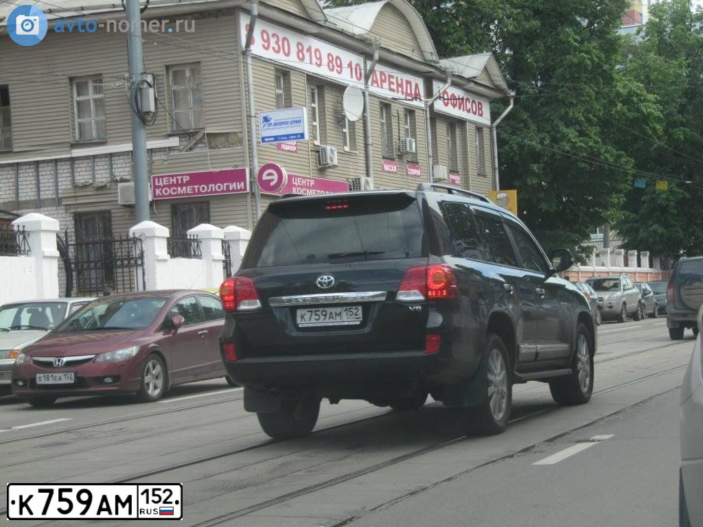 Фото автомобиля TOYOTA LAND CRUISER 200, 2012 — госномер М747РС21. Цвет: ЧЕРНЫЙ