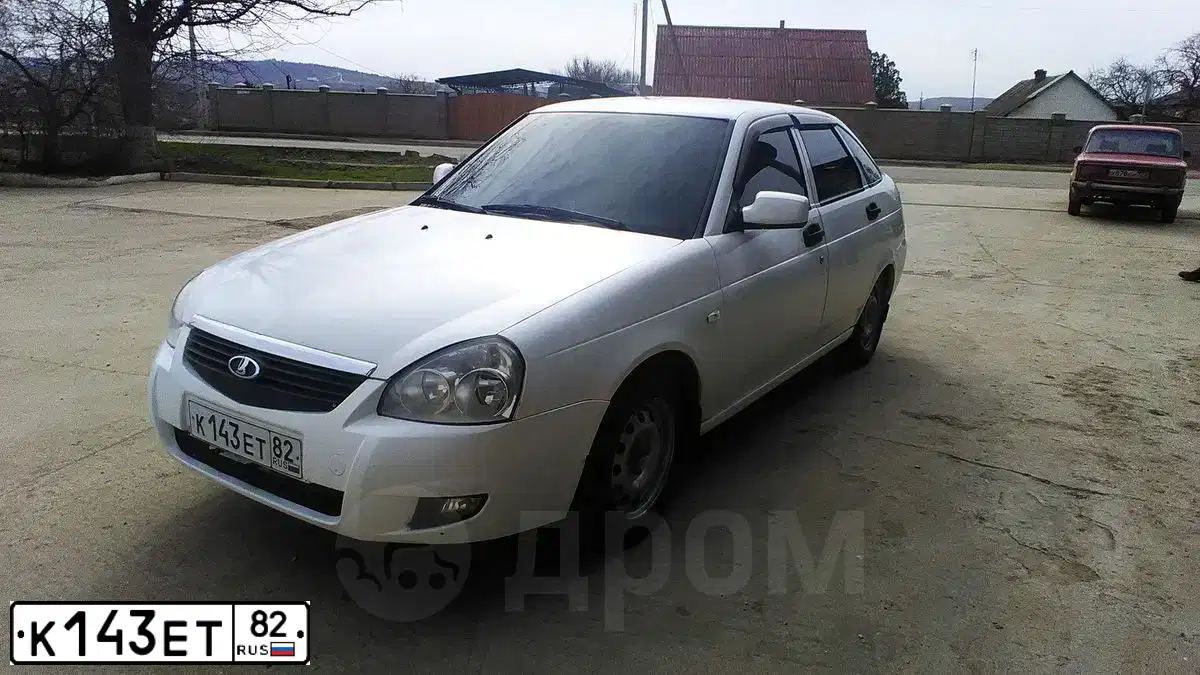 Фото автомобиля LADA 2172 PRIORA, 2009 — госномер К143ЕТ82. Цвет: Белый