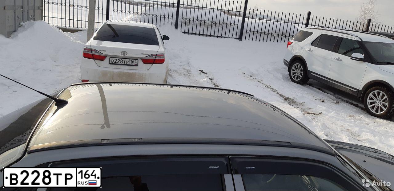 Фото автомобиля TOYOTA CAMRY, 2016 — госномер В228ТР164. Цвет: Белый