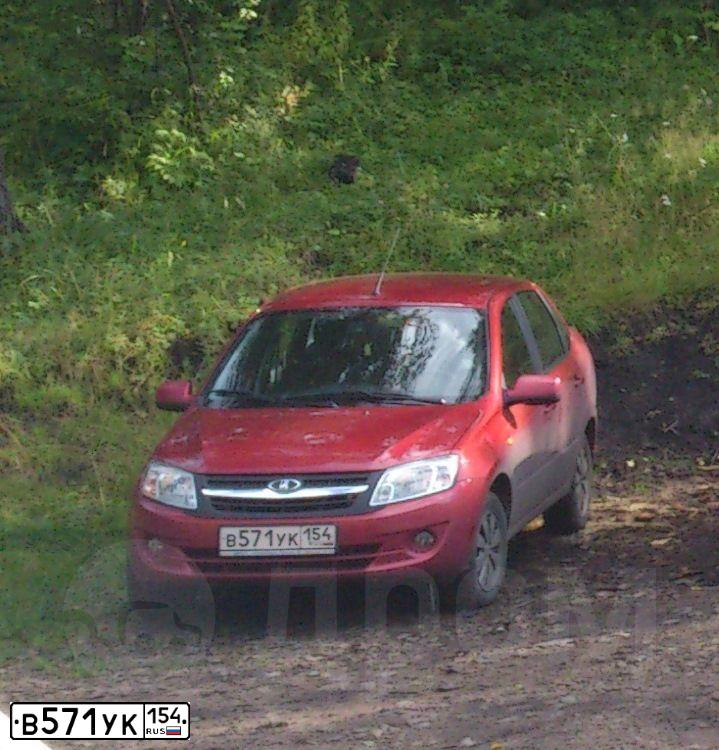Фото автомобиля LADA 2190 GRANTA, 2013 — госномер В571УК154. Цвет: СЕРЕБРИСТО КРАСНЫЙ