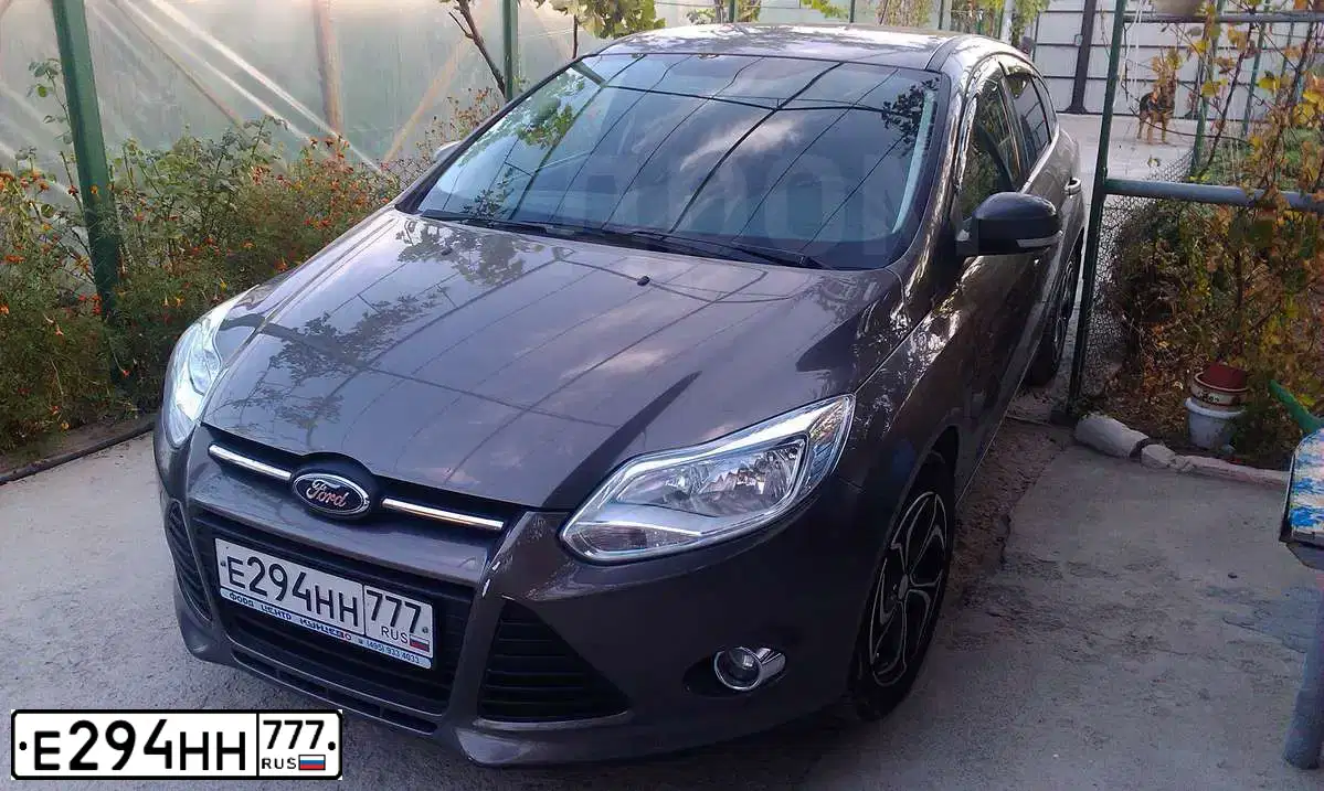 Фото автомобиля FORD FOCUS, 2011 — госномер Н800РК82