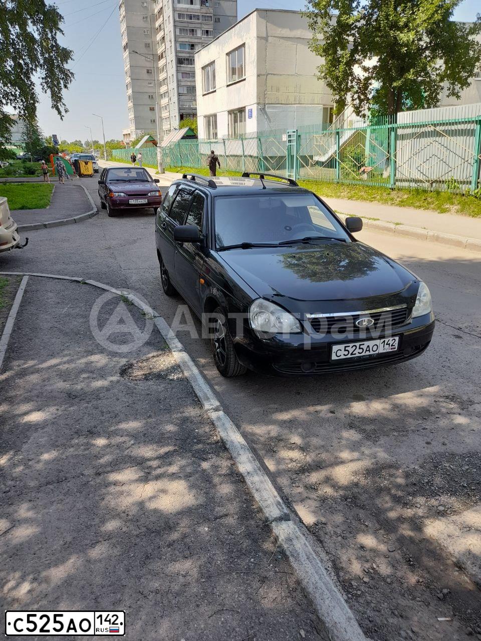 Фото автомобиля LADA 2171 PRIORA, 2012 — госномер С525АС142. Цвет: Сине-Черный