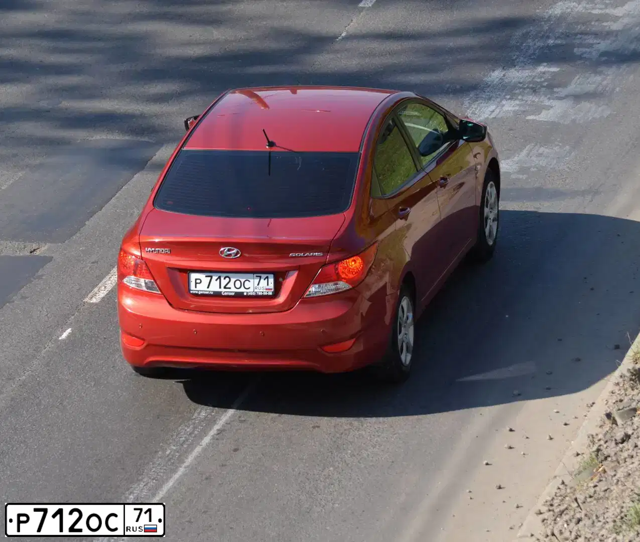Фото автомобиля HYUNDAI SOLARIS, 2011 — госномер Р712ОС71. Цвет: КРАСНЫЙ ГРАНАТ