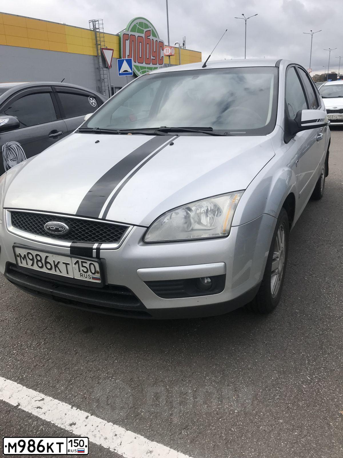 Фото автомобиля FORD FOCUS, 2007 — госномер М986КТ150. Цвет: Серебристый