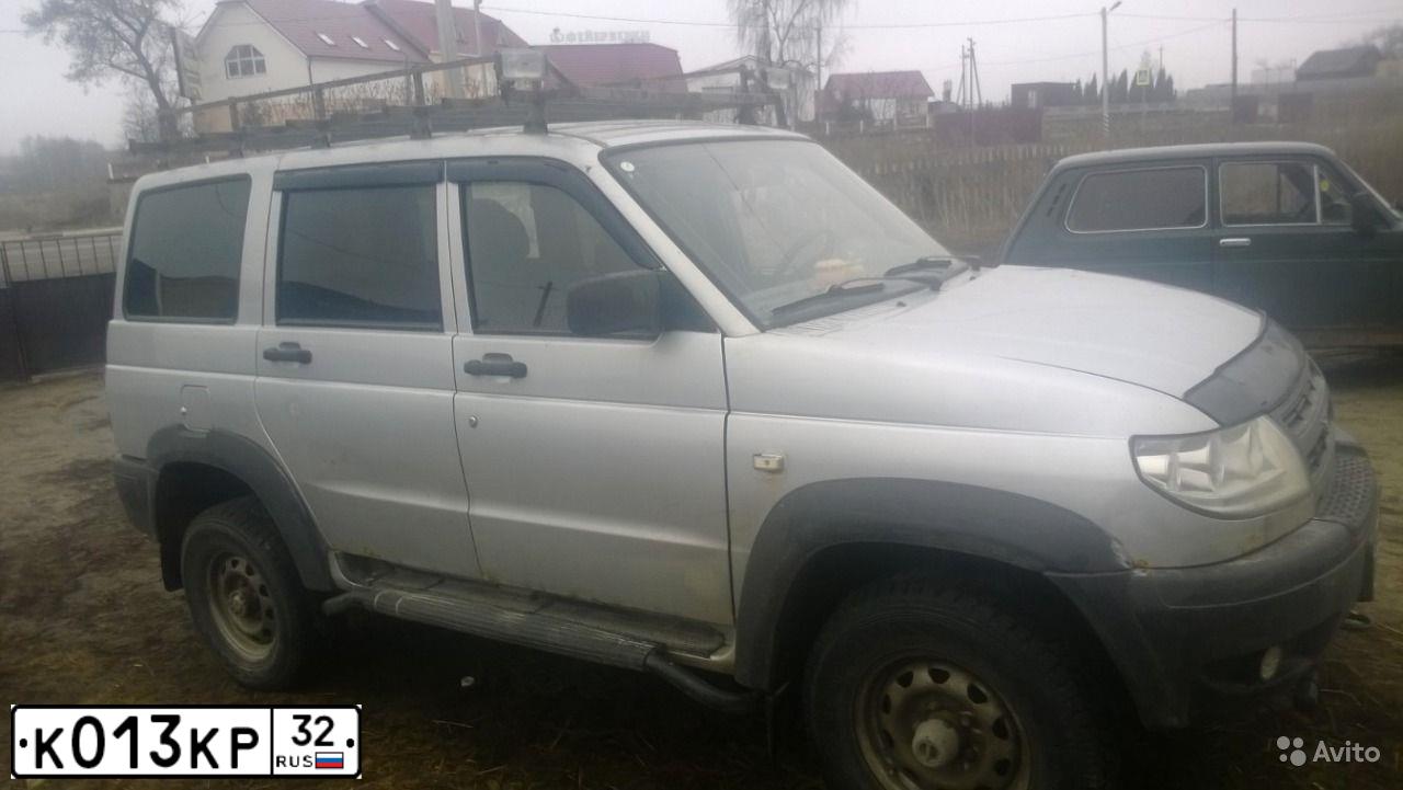 Фото автомобиля UAZ 3163 PATRIOT, 2006 — госномер К013КР32. Цвет: СНЕЖНАЯ КОРОЛЕВА