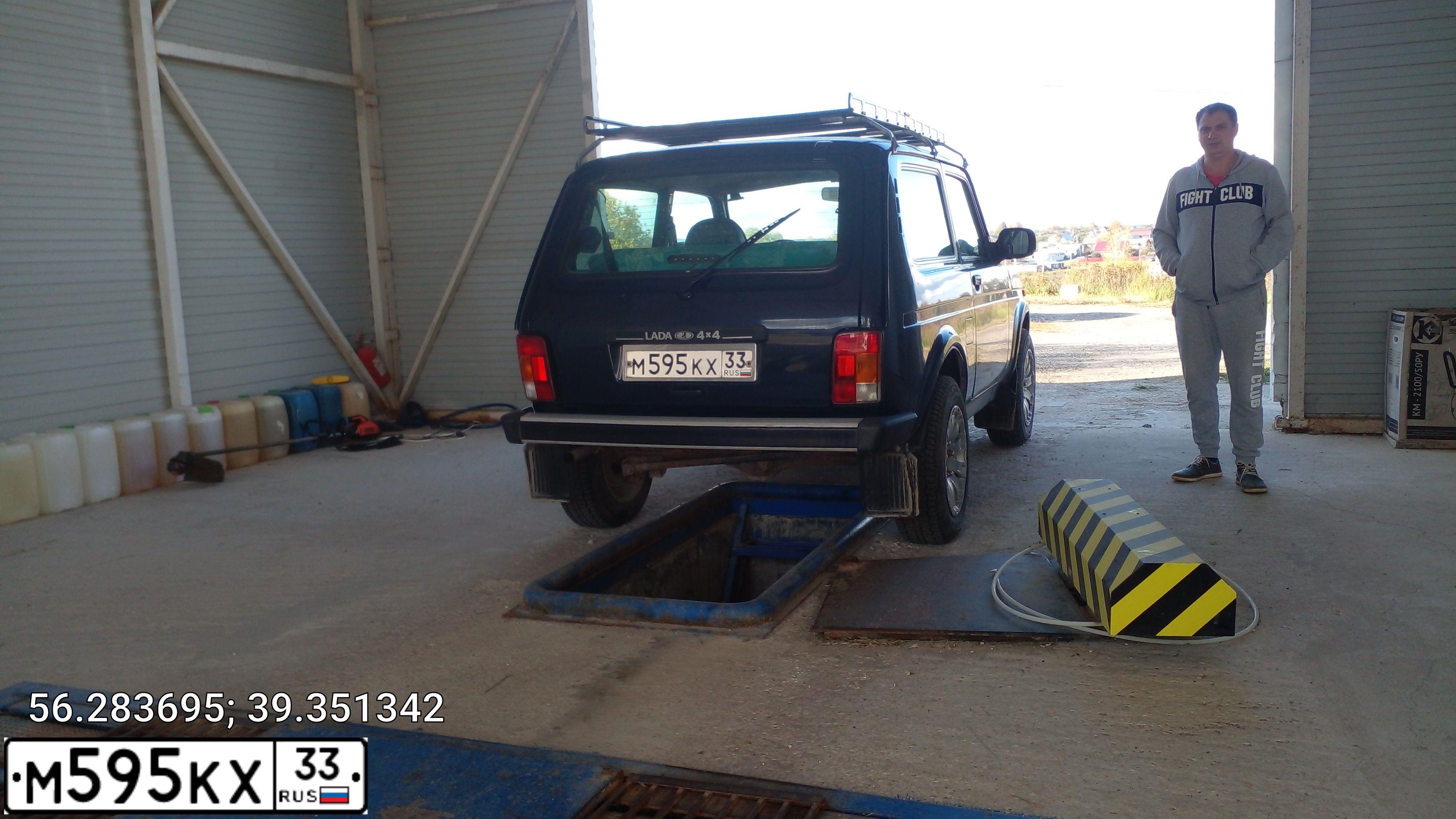 Фото автомобиля LADA 2121 NIVA, 2002 — госномер Т903МВ31. Цвет: ТЕМНО-БОРДОВЫЙ