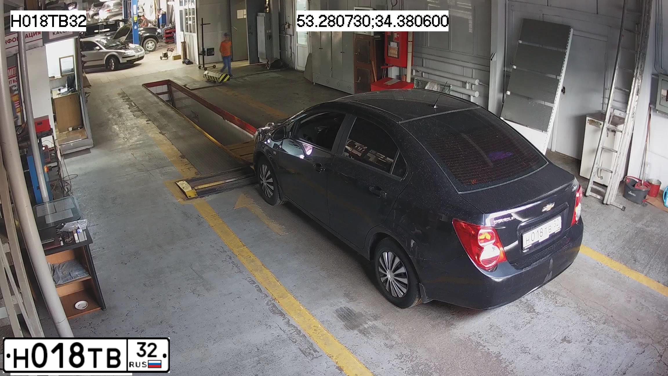 Фото автомобиля CHEVROLET AVEO, 2012 — госномер Н018ТВ32. Цвет: ЧЕРНЫЙ