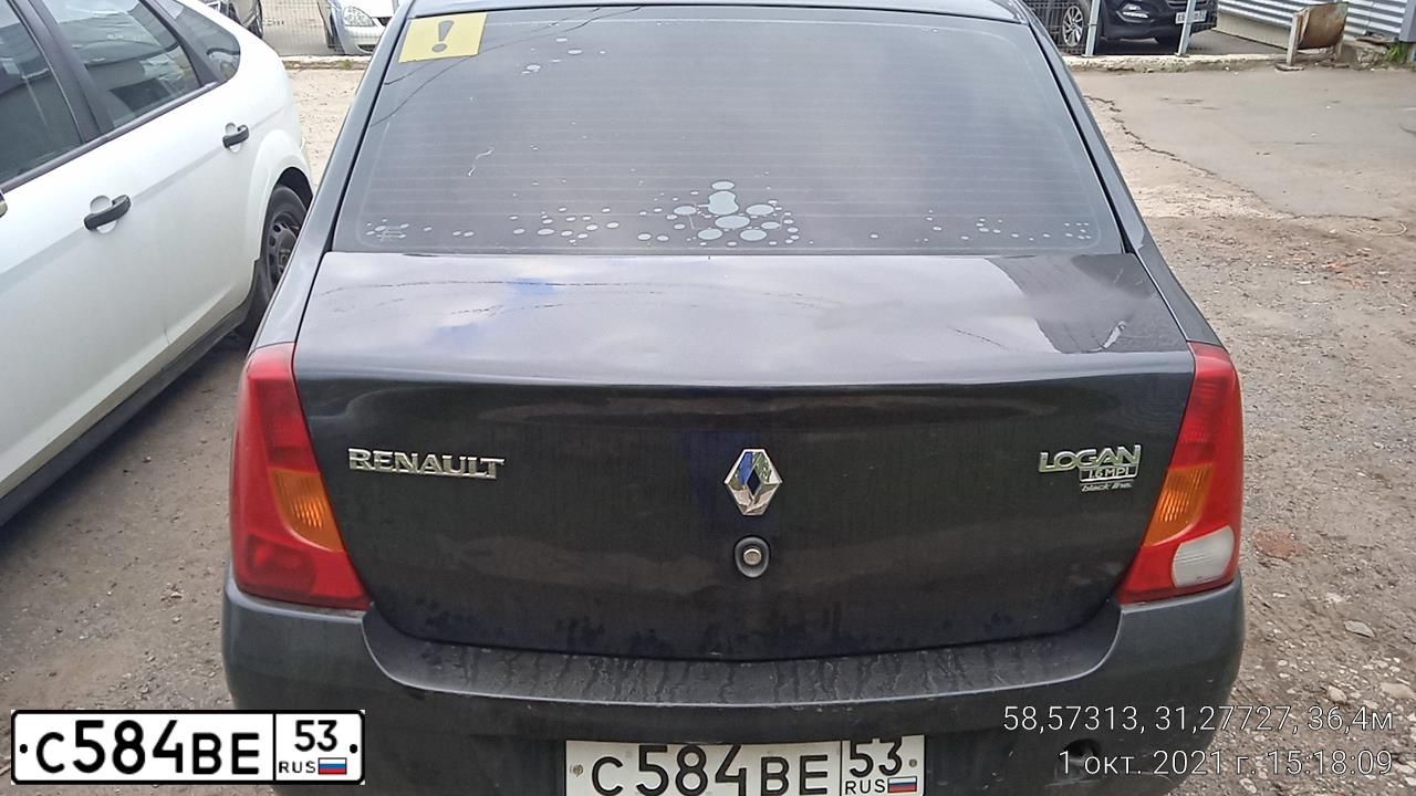 Фото автомобиля RENAULT LOGAN, 2009 — госномер С584ВЕ53. Цвет: ЧЕРНЫЙ