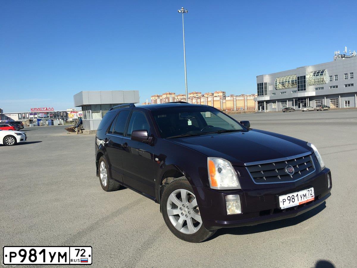 Фото автомобиля CADILLAC SRX, 2006 — госномер У755ВА05. Цвет: ТЕМНО-ВИШНЕВЫЙ