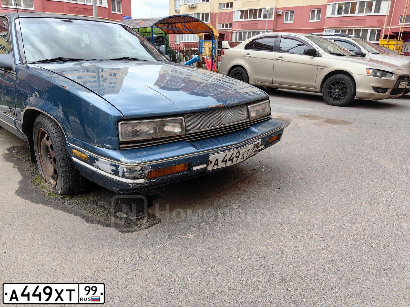 Фото автомобиля OLDSMOBILE CUTLASS, 1988 — госномер А449ХТ99. Цвет: СИНИЙ МЕТАЛЛИК
