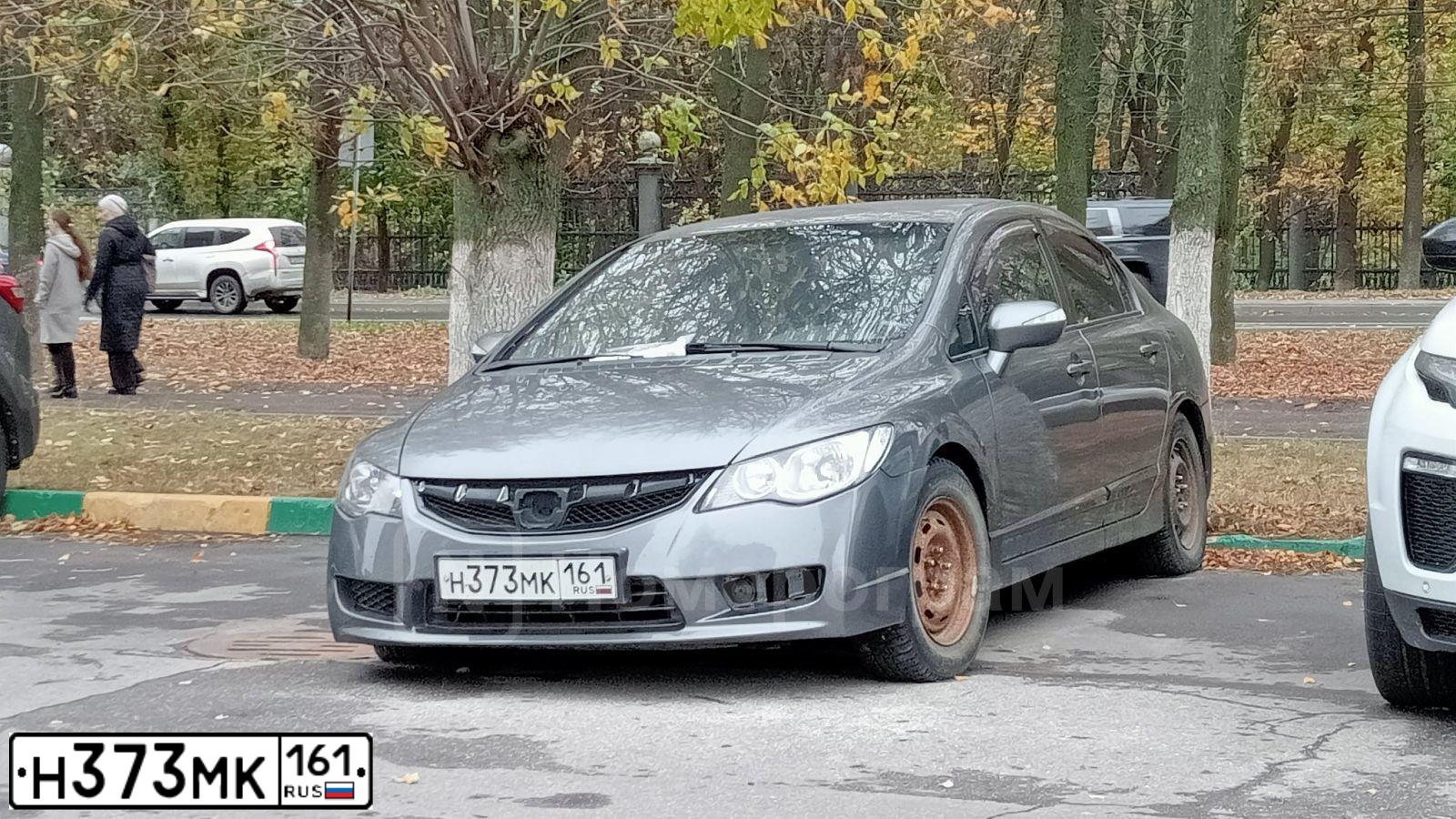 Фото автомобиля HONDA CIVIC, 2010 — госномер Н373МК161. Цвет: СЕРЫЙ