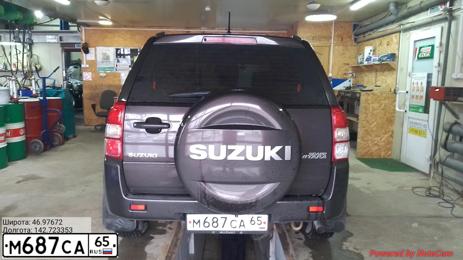 Фото автомобиля SUZUKI /GRAND/ VITARA, 2014 — госномер М687СА65. Цвет: КОРИЧНЕВЫЙ
