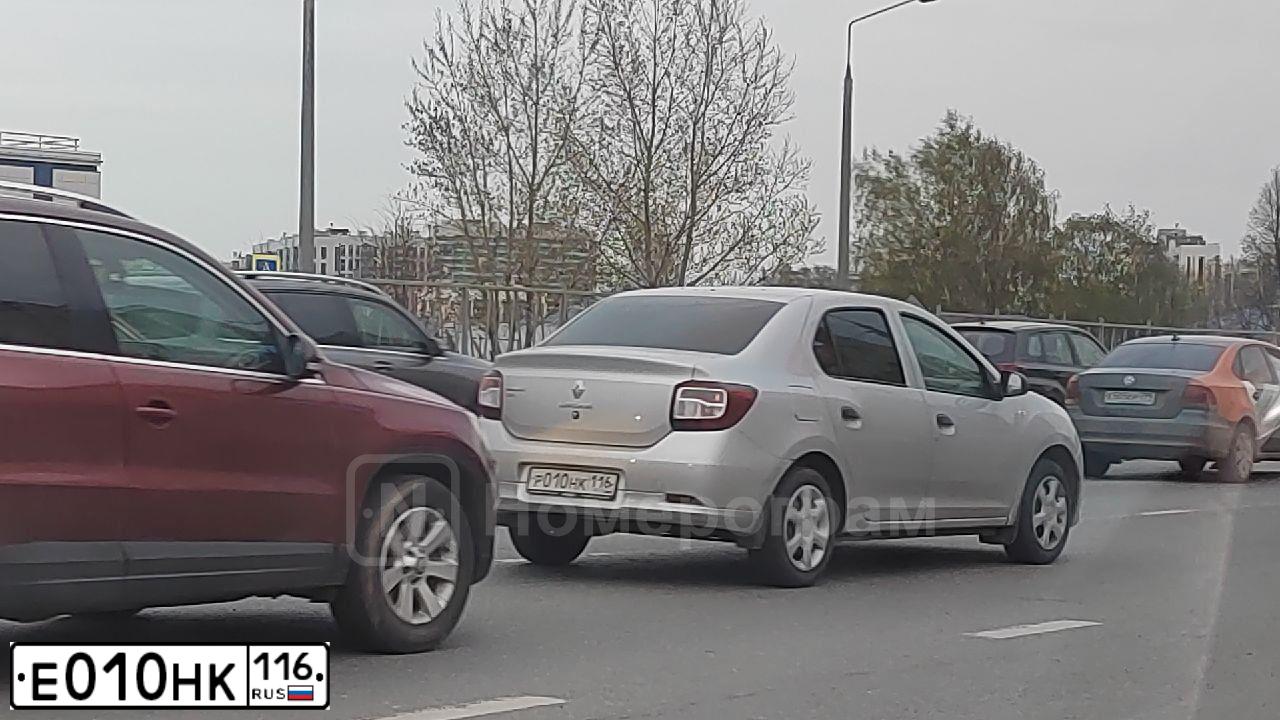 Фото автомобиля NISSAN TIIDA, 2007 — госномер Е010НК116. Цвет: Серебристый