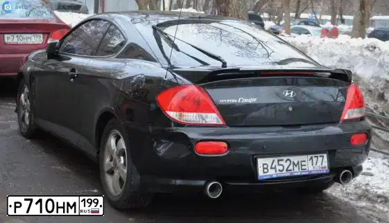 Фото автомобиля LADA 2104, 1999 — госномер Р710НМ199. Цвет: ТЕМНО-БОРДОВЫЙ