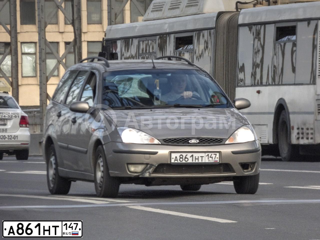 Фото автомобиля FORD D FOCUS, 2003 — госномер В631ЕС198. Цвет: СЕРО-ЗОЛОТИСТЫЙ