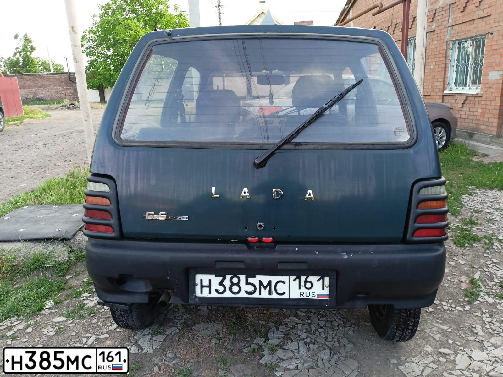 Фото автомобиля ВАЗ 111130-22, 2002 — госномер Р011МА761. Цвет: ЗЕЛЕНЫЙ