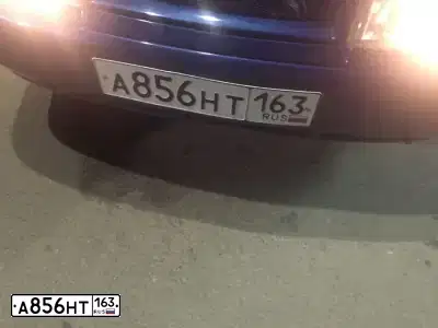 Фото автомобиля LADA 2112, 2003 — госномер М121АХ82. Цвет: серебристо-ярко-синий