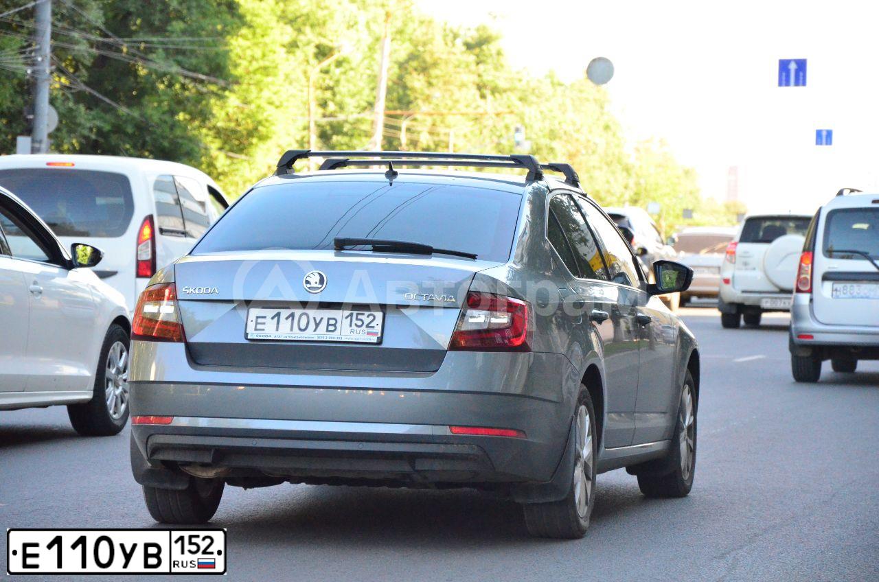 Фото автомобиля FORD FOCUS, 2011 — госномер Е110УВ152. Цвет: СВЕТЛО-СЕРЫЙ