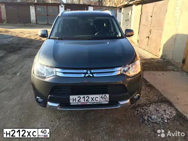 Фото автомобиля MITSUBISHI OUTLANDER, 2014 — госномер Н212ХС40. Цвет: СЕРЫЙ